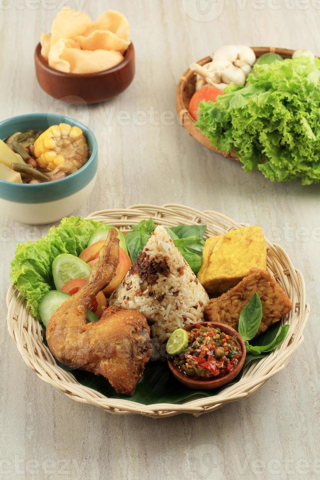 Nasi Tutug Oncom. Traditional Sundanese Meal of Rice Mixed with Fermented Soybean photo