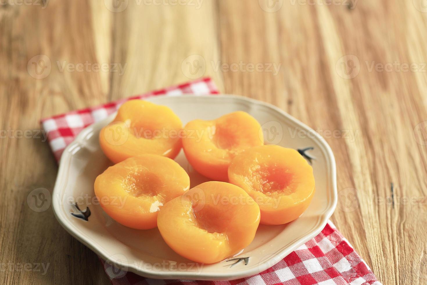 Canned Peach Halves in Ceramic Plate photo