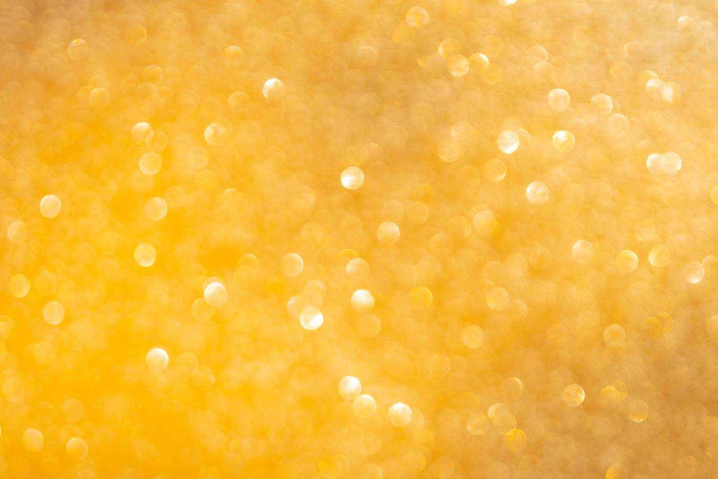 Yellow bokeh and defocused background with copy space photo