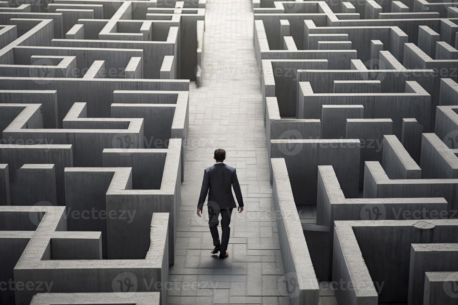 businessman walking in labyrinth cement wall to success way and finding solution photo