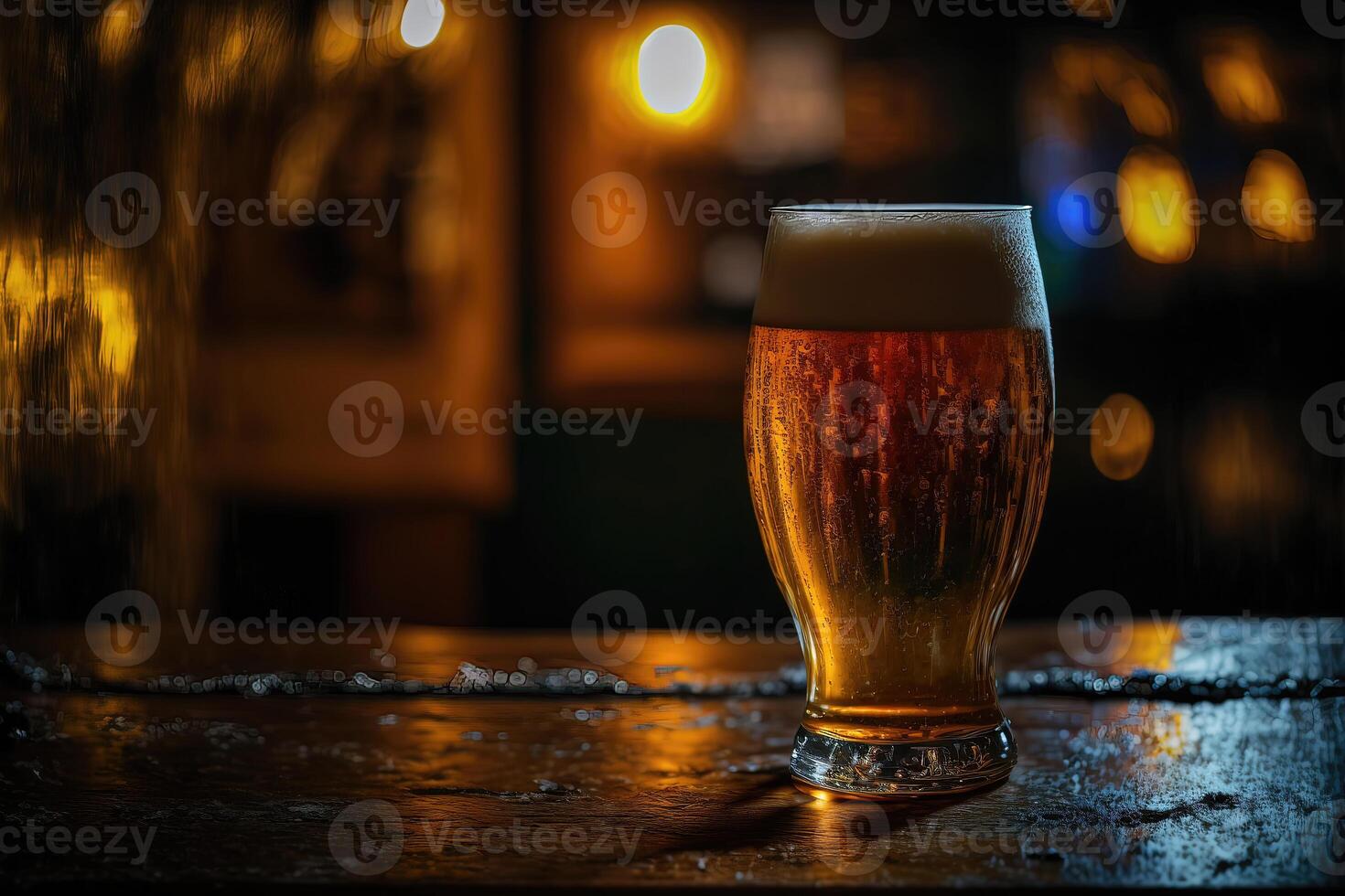 Glass of light beer on dark pub blurred background. Close up photo