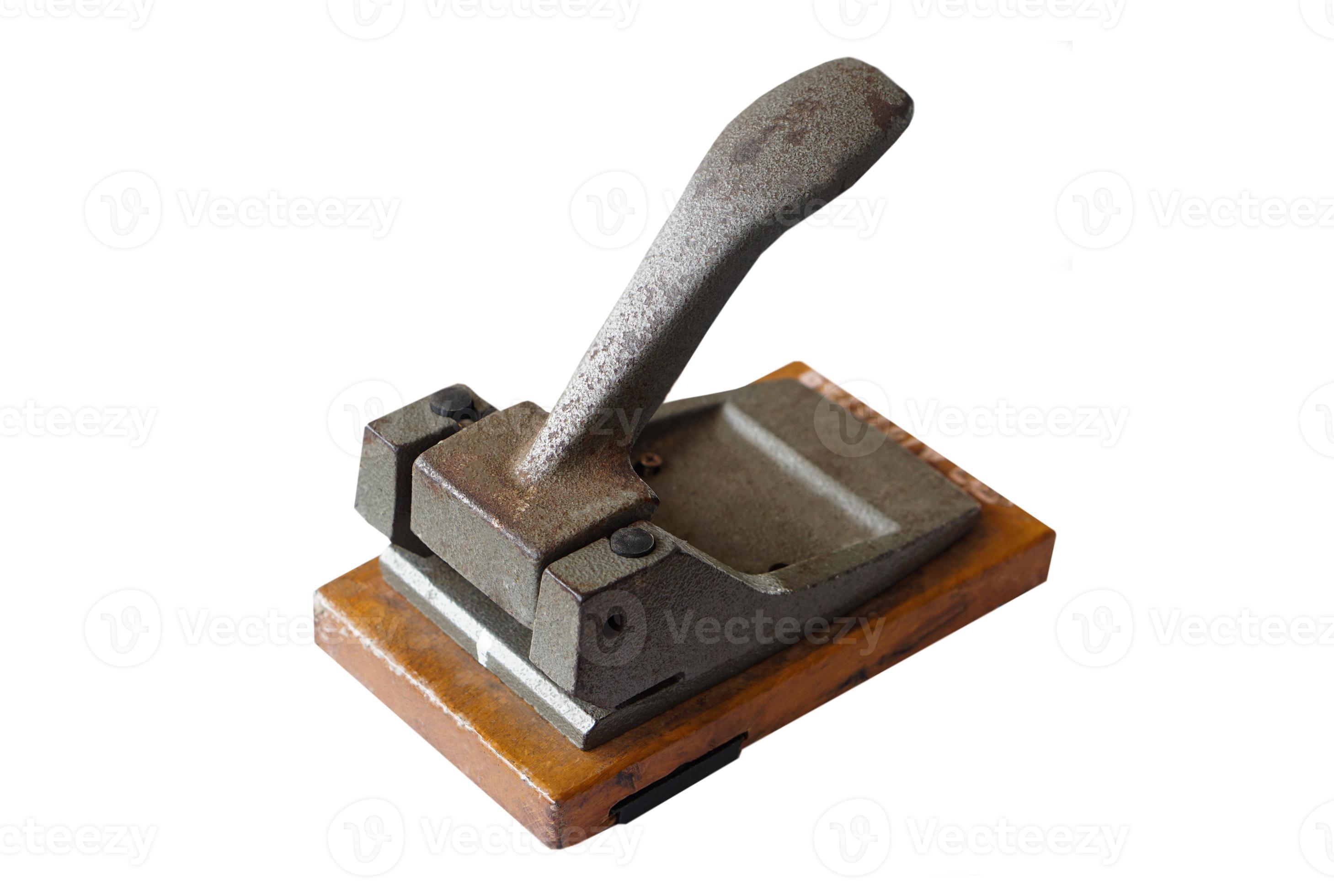 Old vintage iron paper hole puncher isolated on white background. Concept,  office tool, equipment to make hole of paper document before arranging or  keeping into binders file. 21790047 Stock Photo at Vecteezy