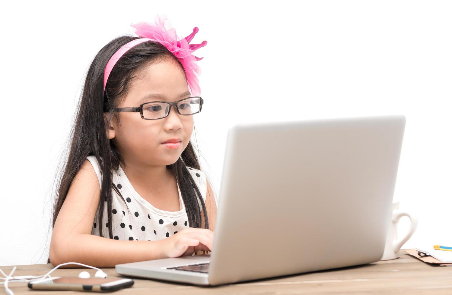 cute student girl with laptop computer on the table photo