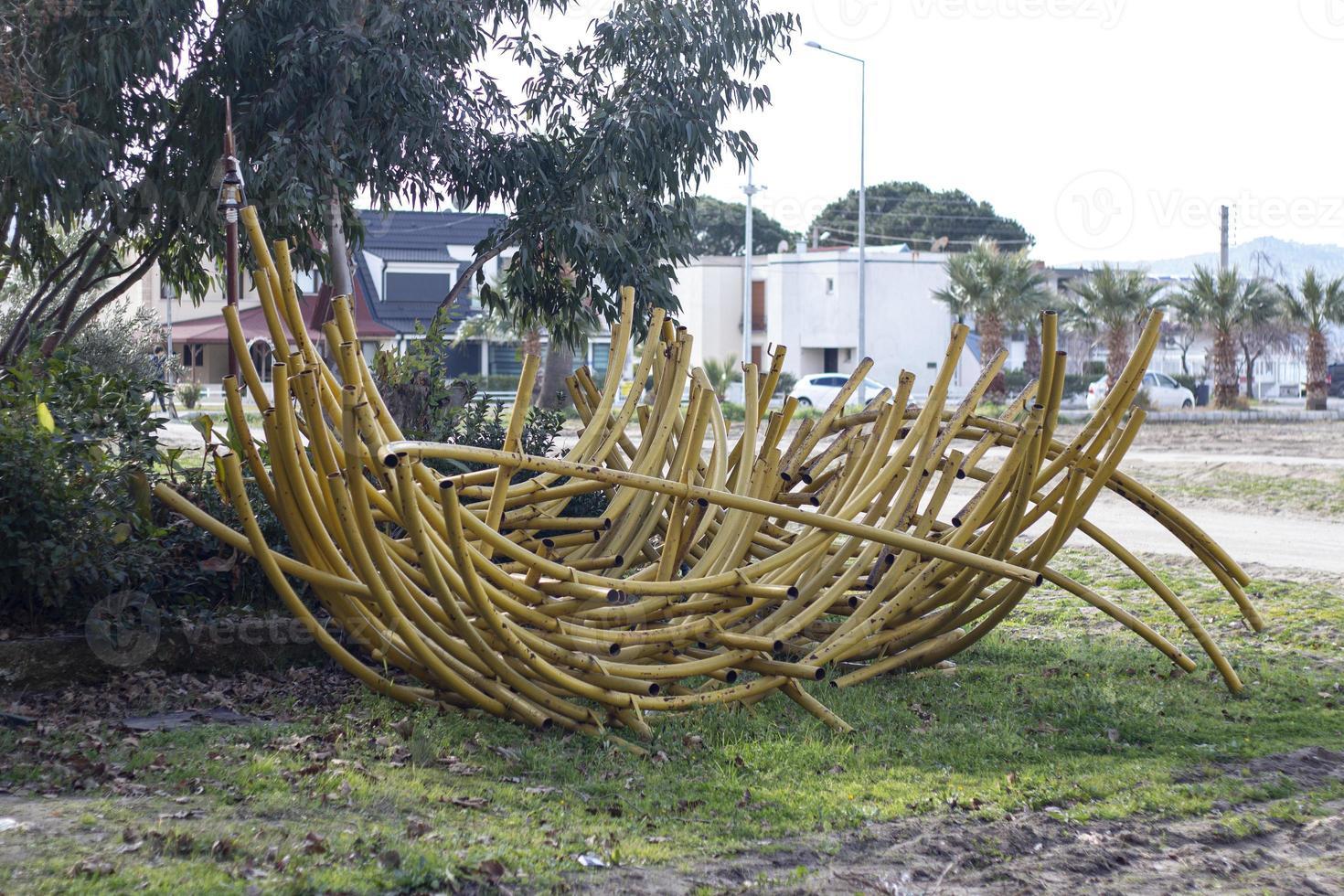 Wicker hammock made of bamboo in a park in the city. photo