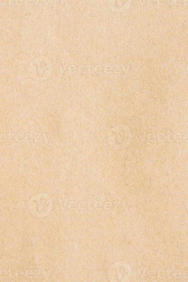 Sheet of yellow abstract cardboard useful as background. Close-up of texture material carton photo