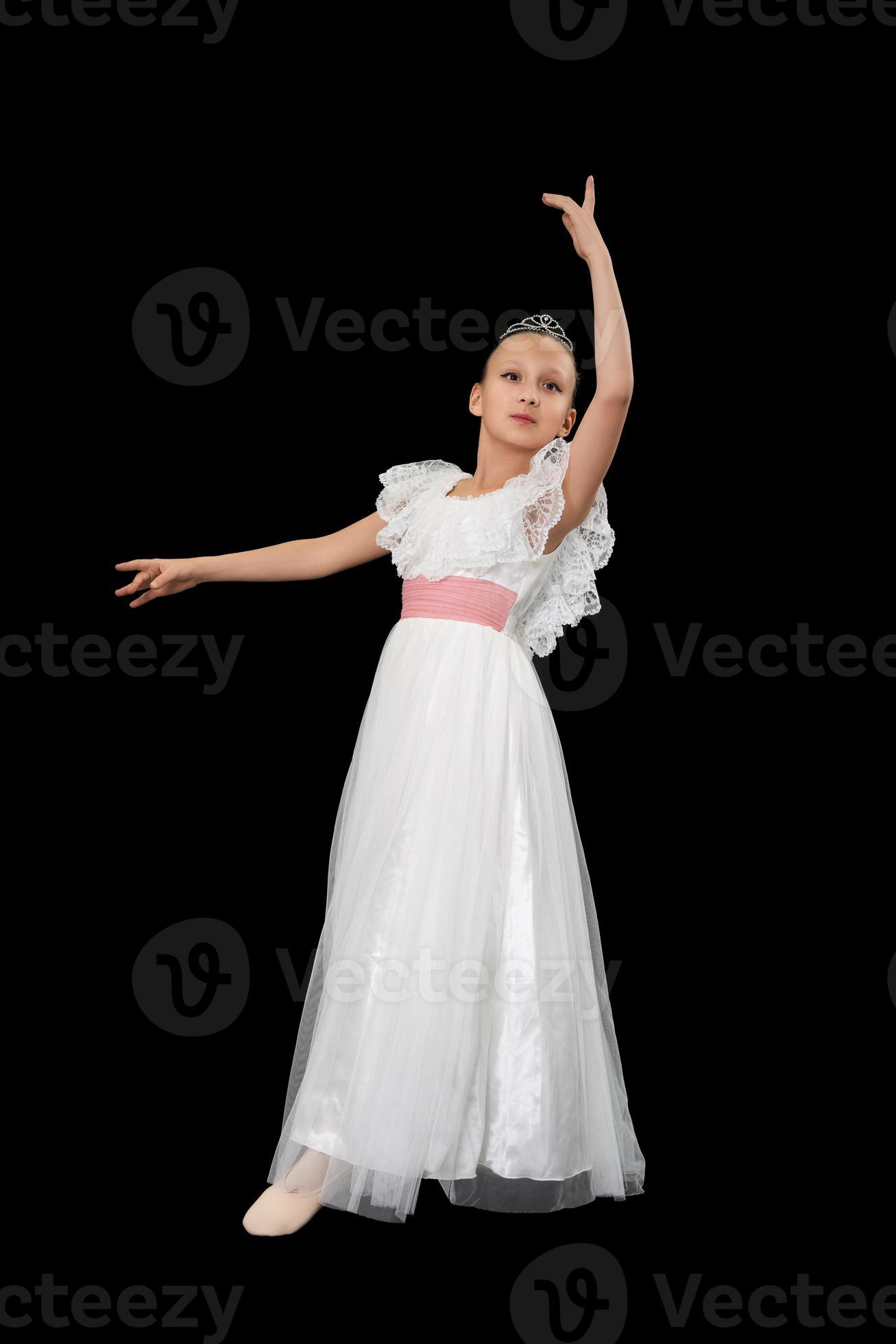 Girl ballet dancer in white long dress dancing on black background 21791996 Stock Photo at Vecteezy