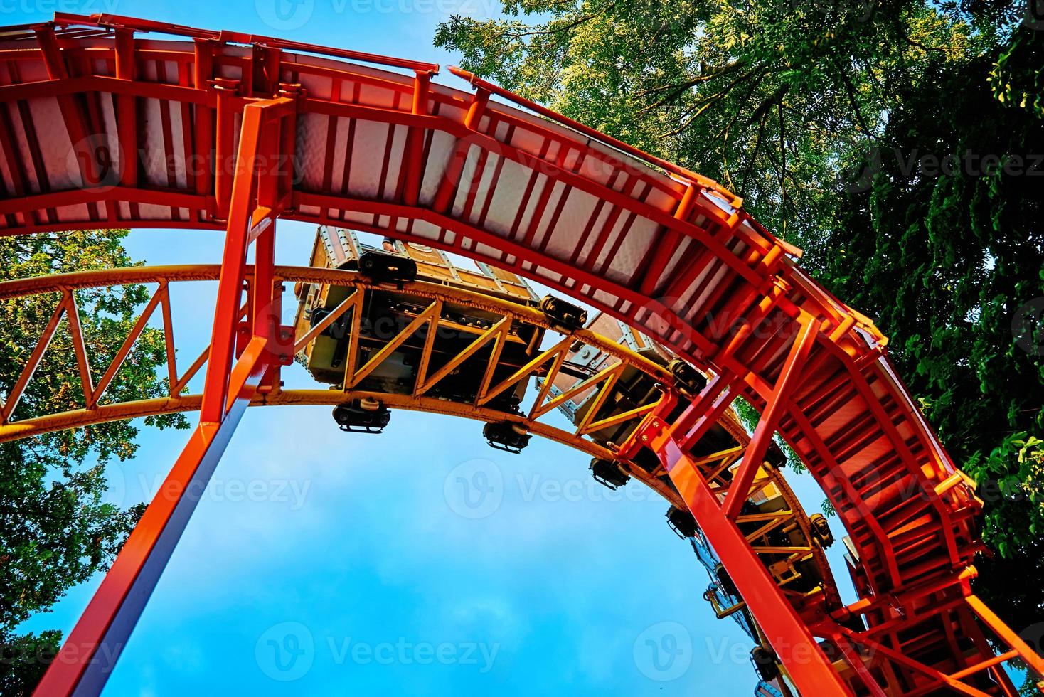 Part of roller coaster at summer day photo