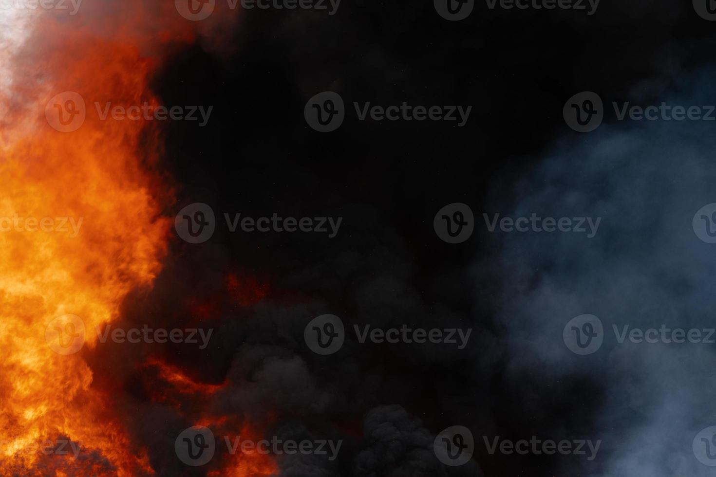 Dangerous huge flames of red fire, motion blur clouds of dark smoke covered sky photo