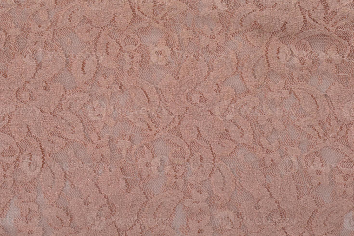 Pink lace background. Delicate guipure. Texture fabric. photo