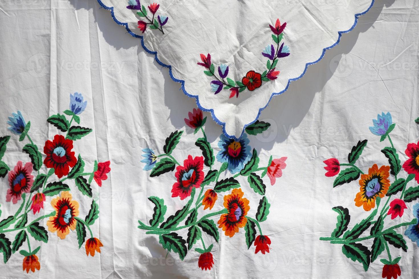 Slavic embroidered towels. National Ukrainian or Belarusian ethnic patterns on the fabric. photo