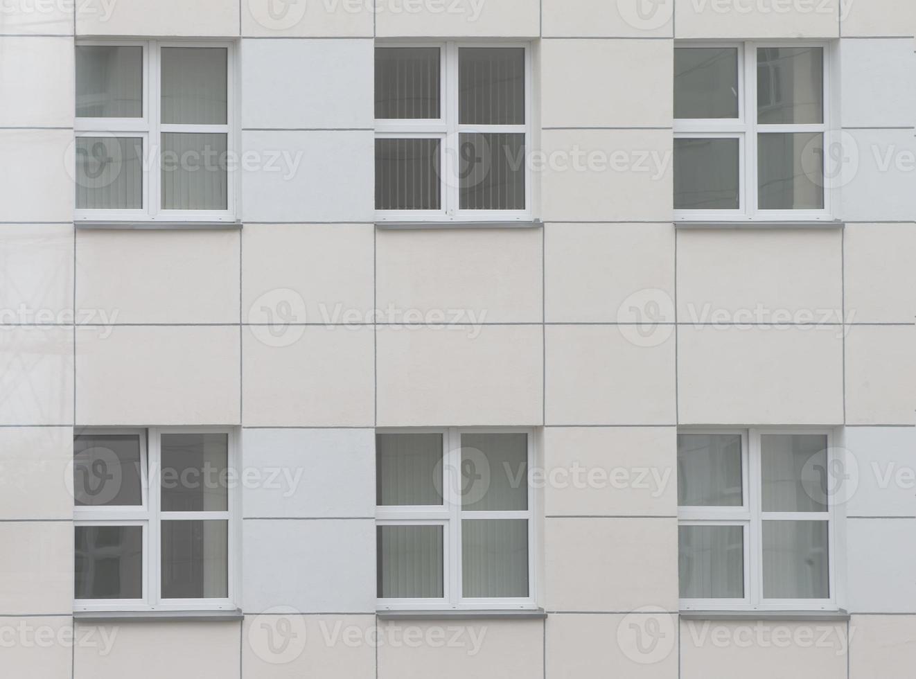 Background windows in a modern building made of tiles. photo