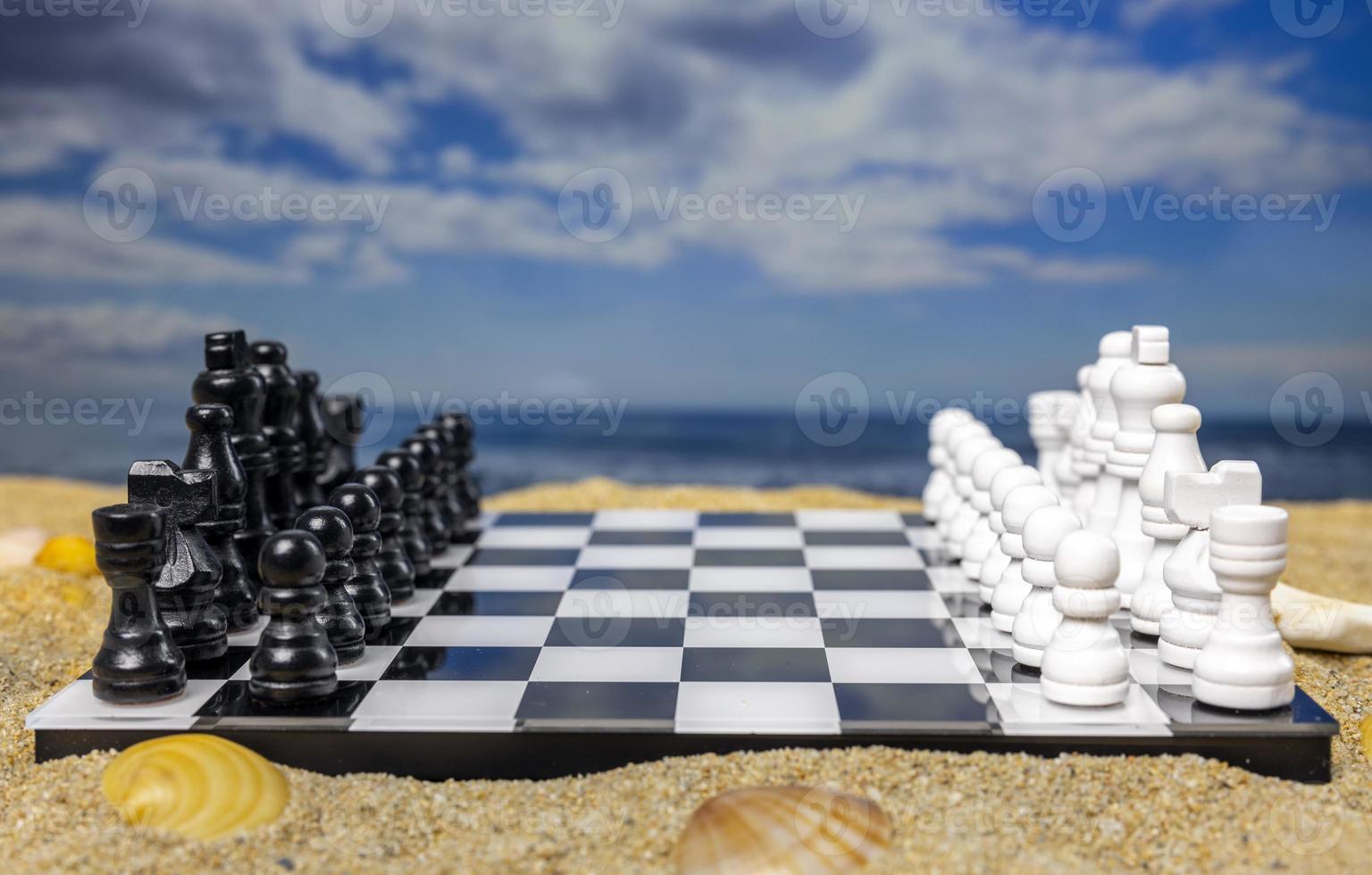 A game of chess on a beautiful beach photo