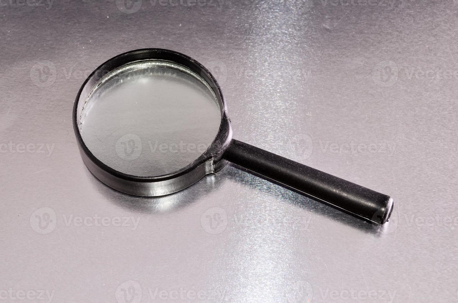 Glass magnifying loupe photo
