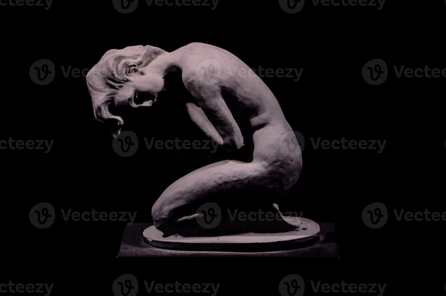 Figurine on dark background photo