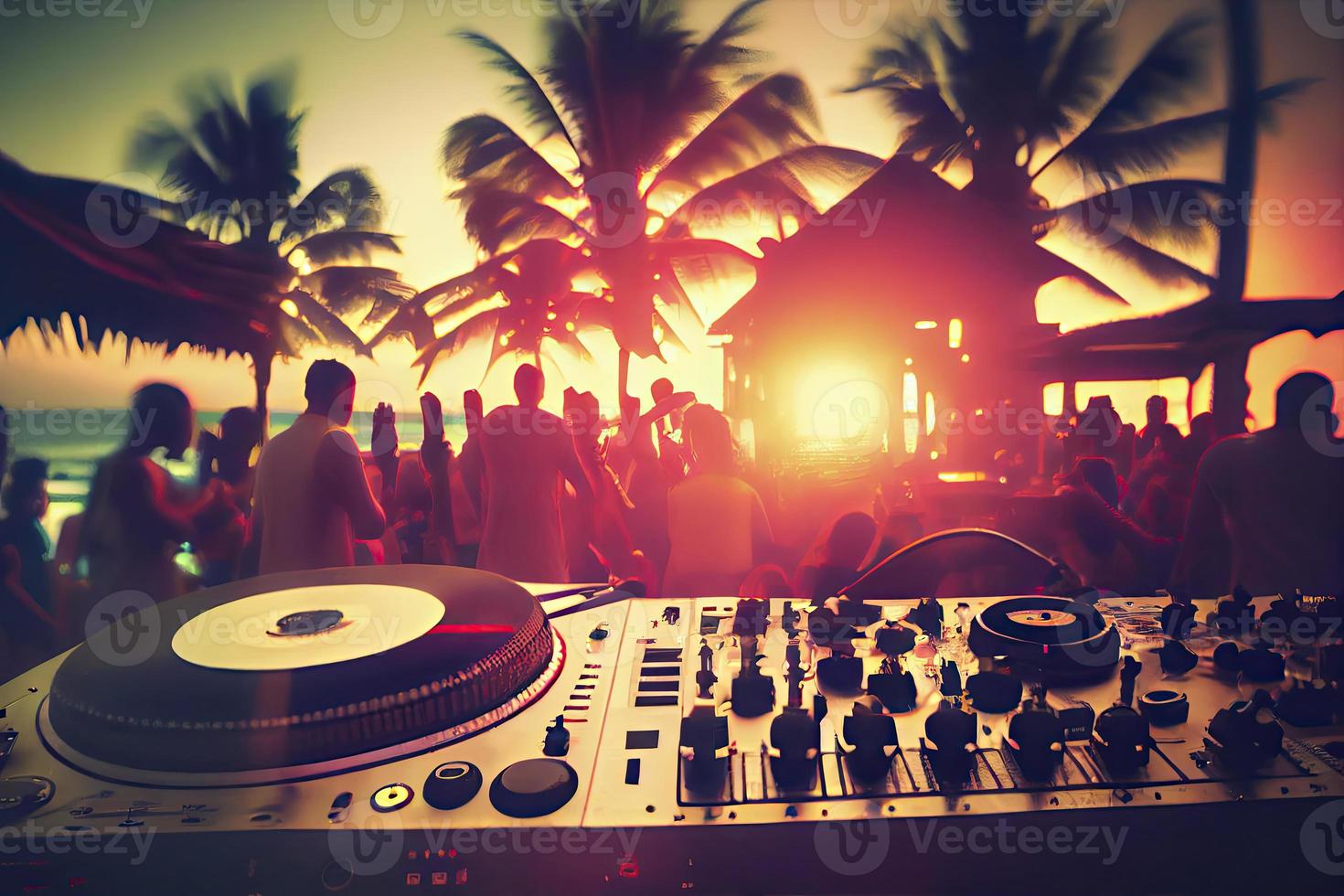 Dj mixing outdoor at beach party festival with crowd of people in background - Summer nightlife photo