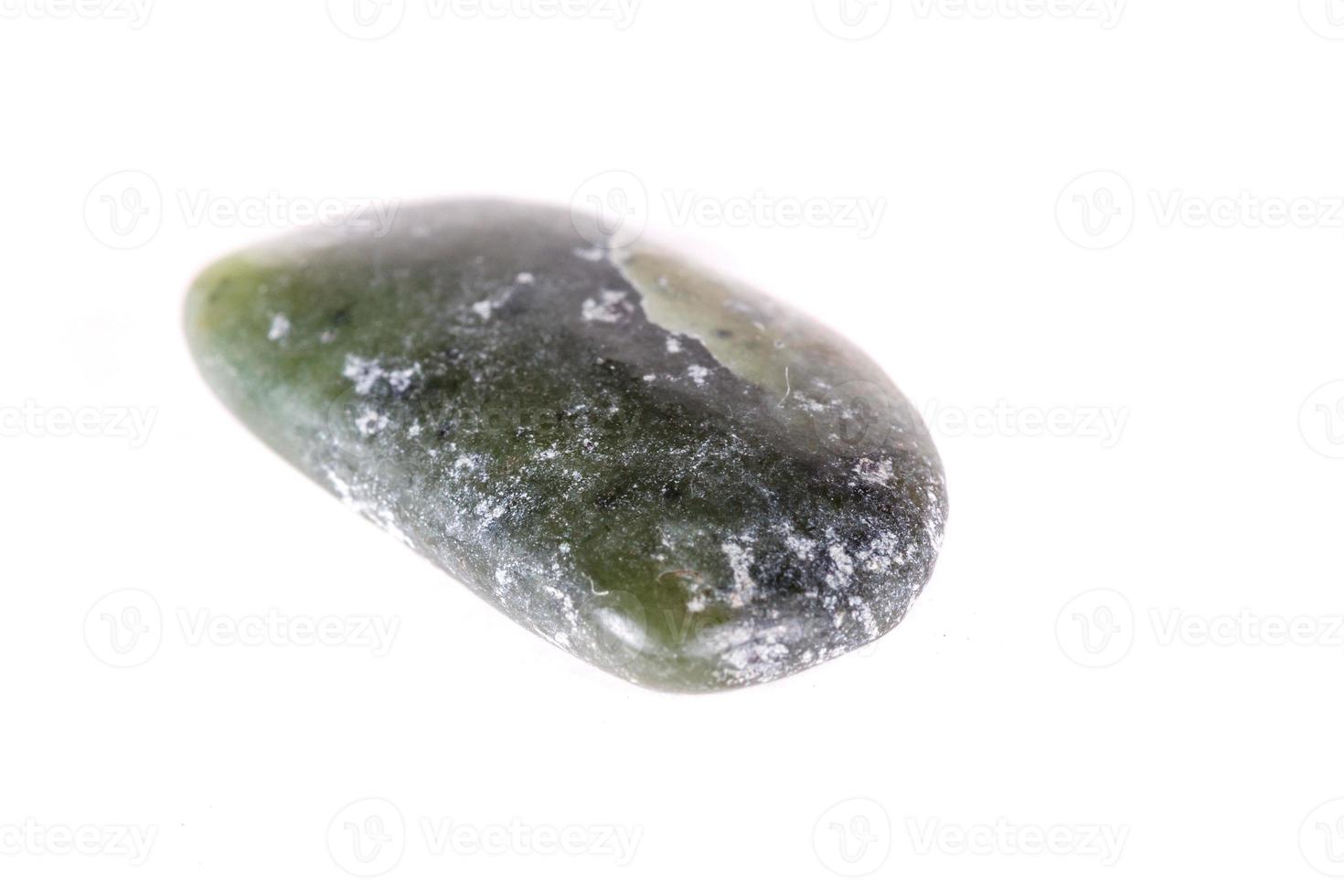 Macro mineral stone jasper on a white background photo