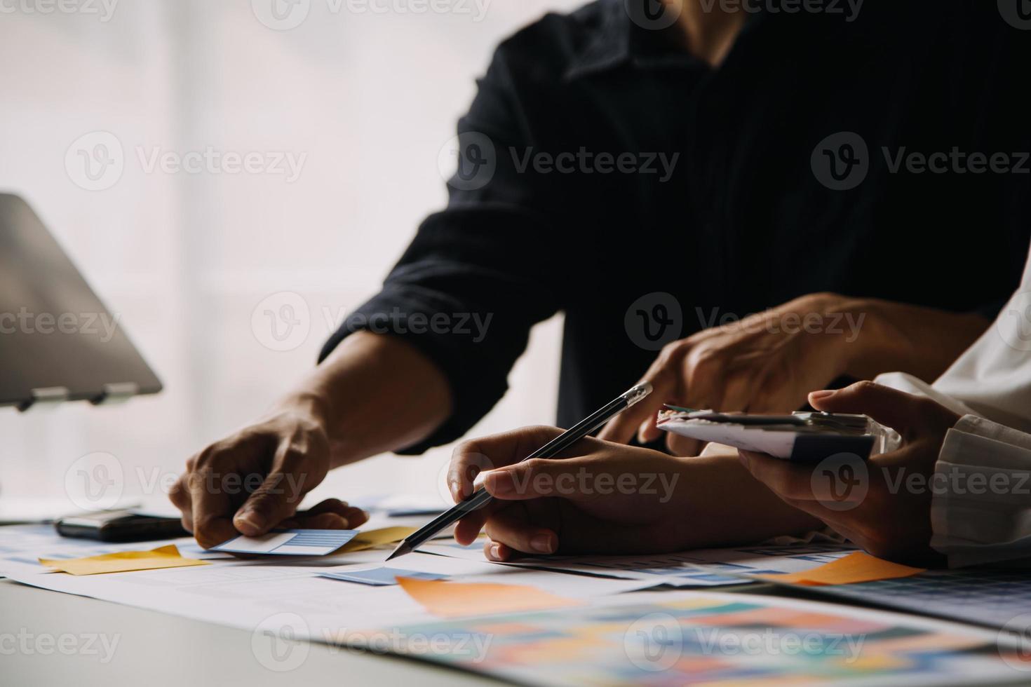 Close up ux developer and ui designer use augmented reality brainstorming about mobile app interface wireframe design on desk at modern office.Creative digital development agency photo