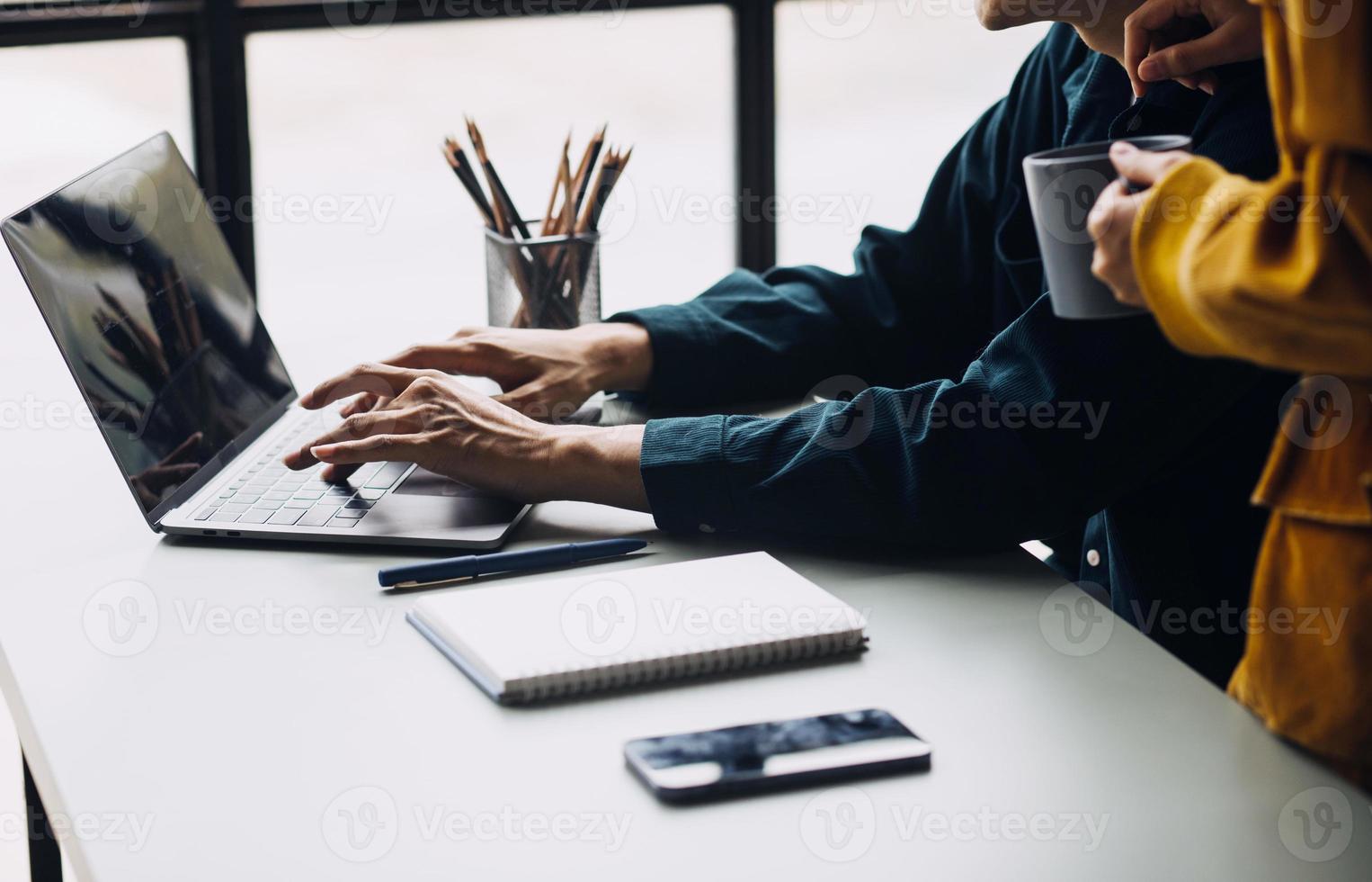 Close up ux developer and ui designer use augmented reality brainstorming about mobile app interface wireframe design on desk at modern office.Creative digital development agency photo