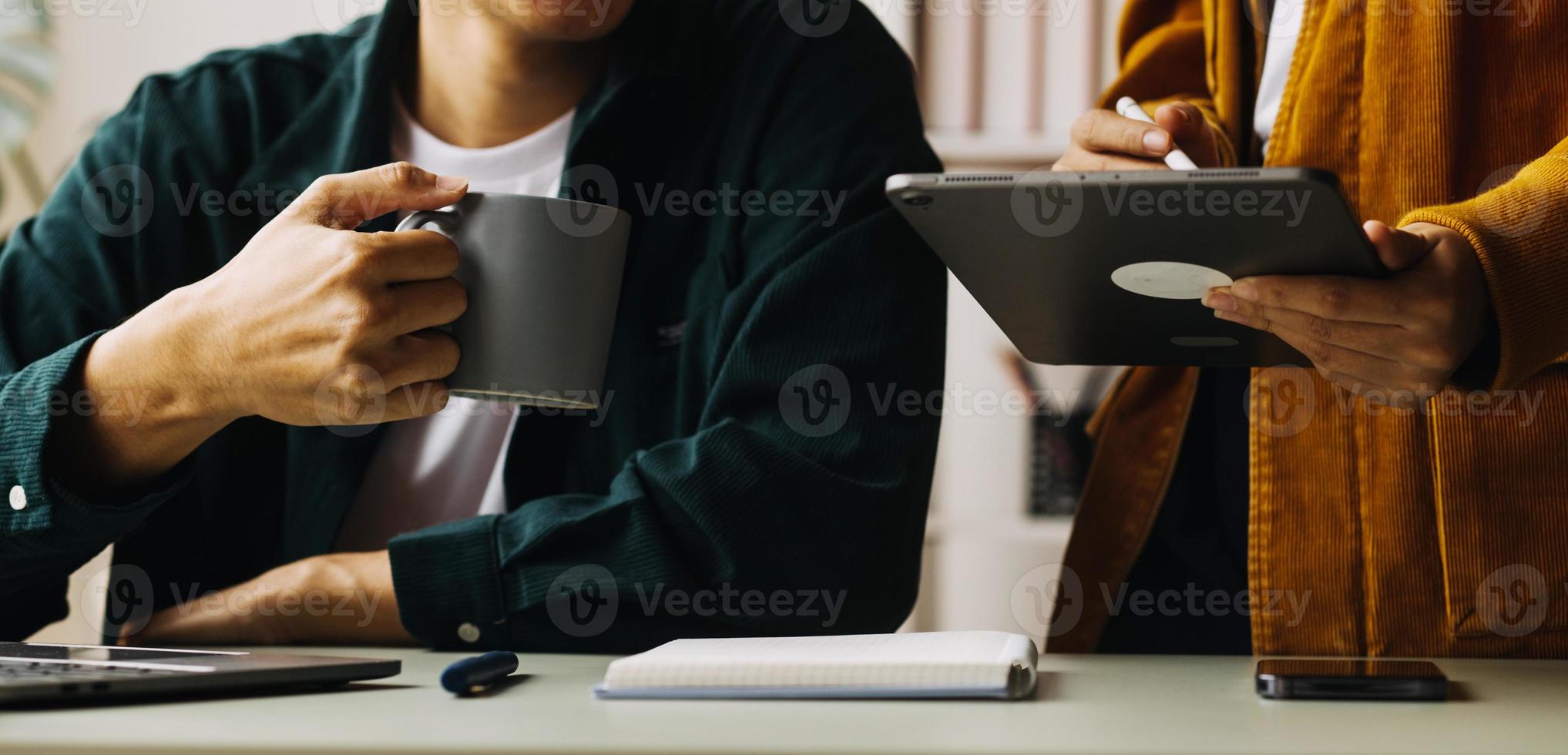 Close up ux developer and ui designer use augmented reality brainstorming about mobile app interface wireframe design on desk at modern office.Creative digital development agency photo