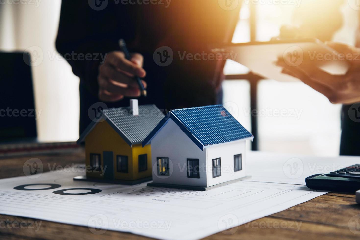 Construction and structure concept of engineer working drawing on blueprint meeting for project working with partner on model building and engineering tools in working site, construction concept photo