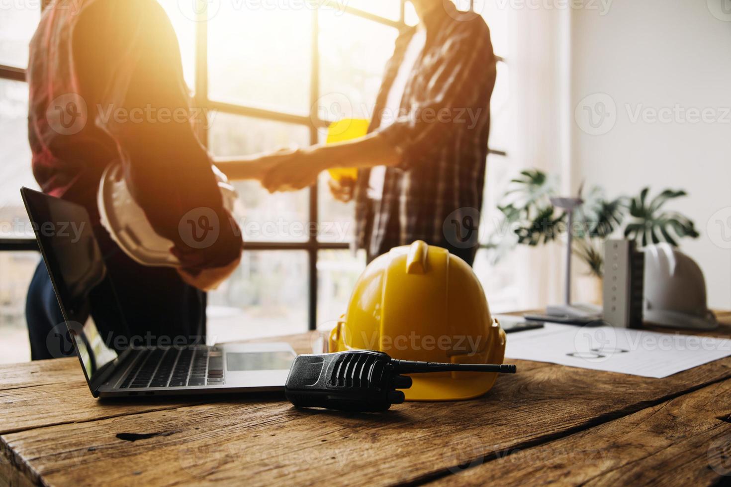 Construction and structure concept of engineer working drawing on blueprint meeting for project working with partner on model building and engineering tools in working site, construction concept photo