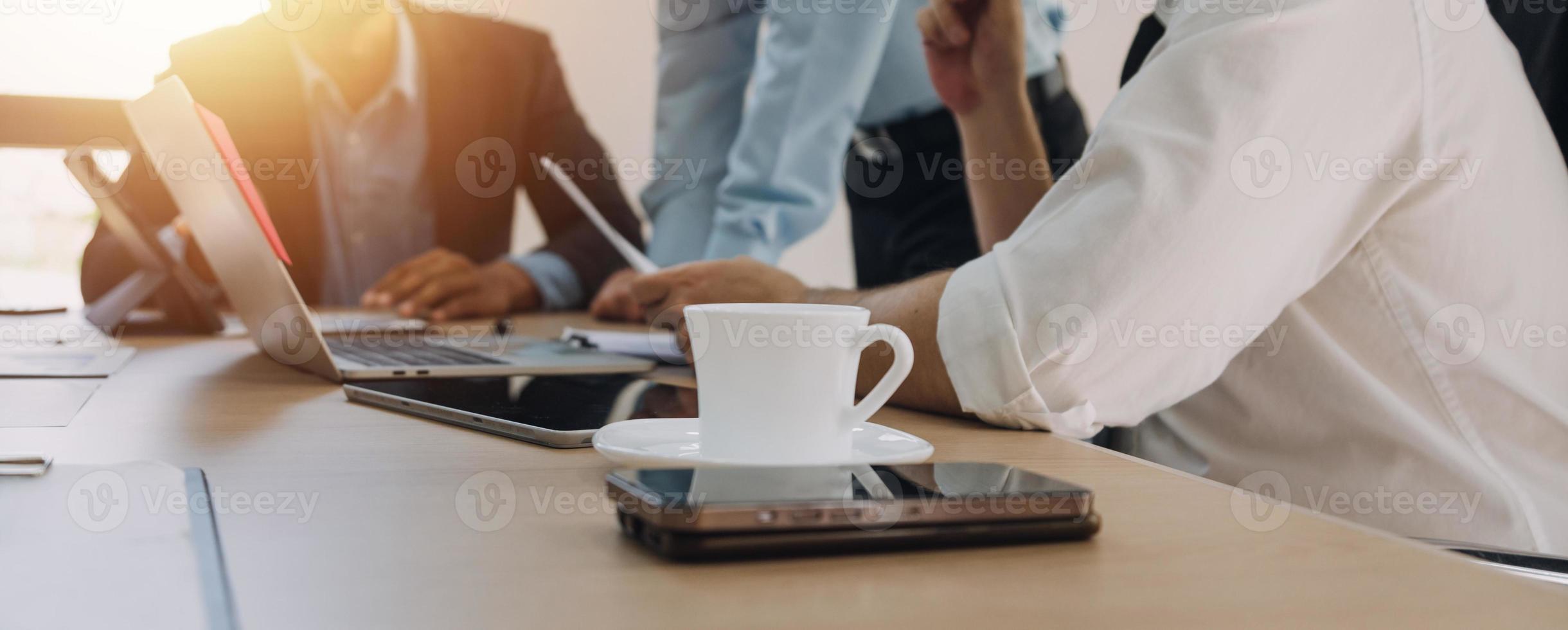 Entrepreneurs and business people conference in modern meeting room, happy multiracial coworkers have fun cooperating working together at office meeting, asian teamwork concept photo