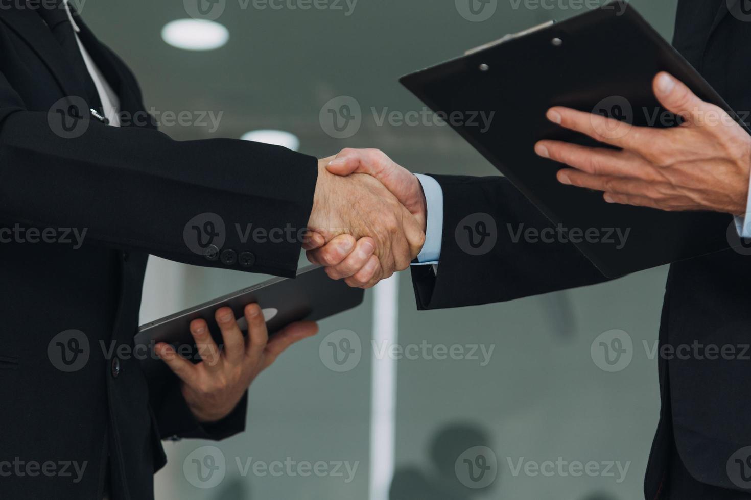 Entrepreneurs and business people conference in modern meeting room, happy multiracial coworkers have fun cooperating working together at office meeting, asian teamwork concept photo