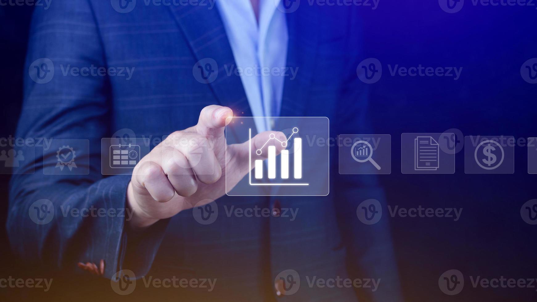 Big data analytics and business intelligence BI concept with chart and graph icons on digital screen interface and business people in the background. photo