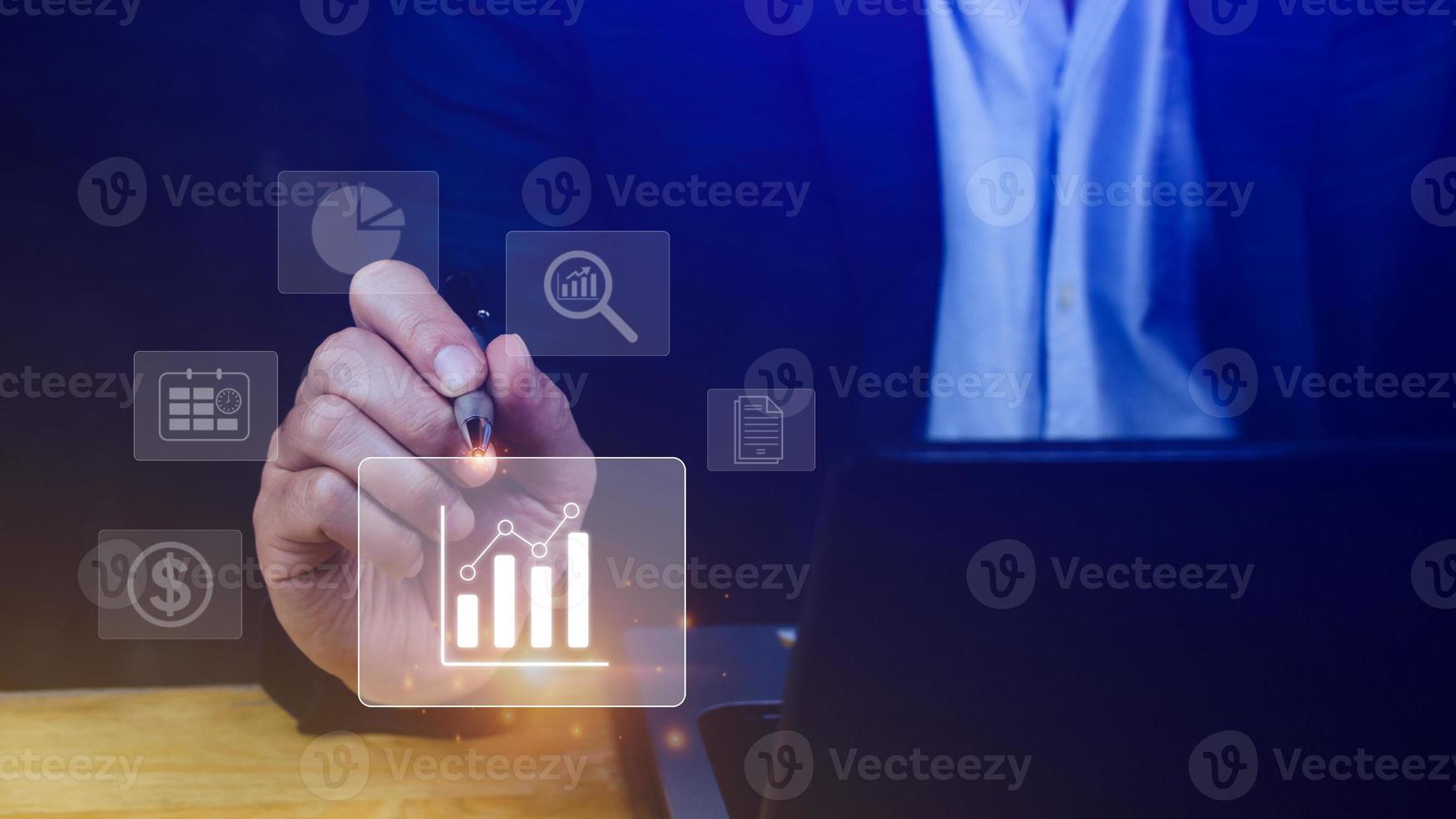 Big data analytics and business intelligence BI concept with chart and graph icons on digital screen interface and business people in the background. photo