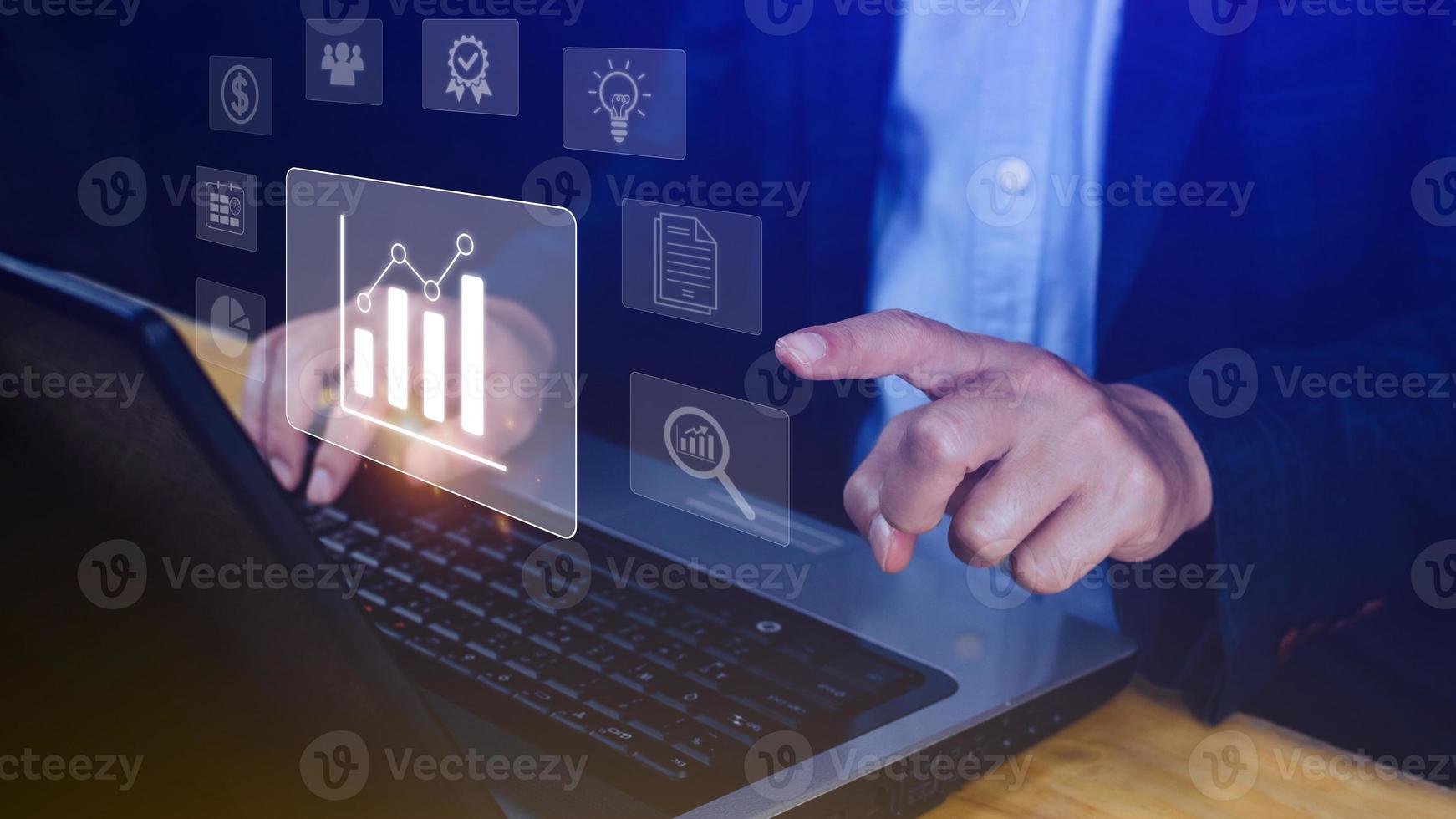 Big data analytics and business intelligence BI concept with chart and graph icons on digital screen interface and business people in the background. photo