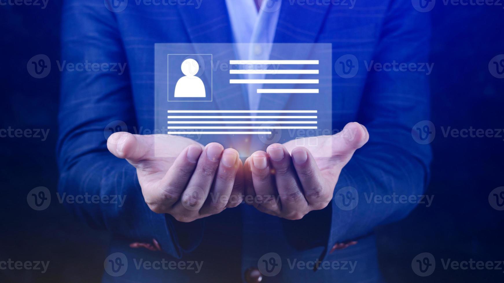 Human resources manager choosing professional profile to hire on virtual screen interface, recruitment concept. Businessman hand pointing icon resource HR management concept photo