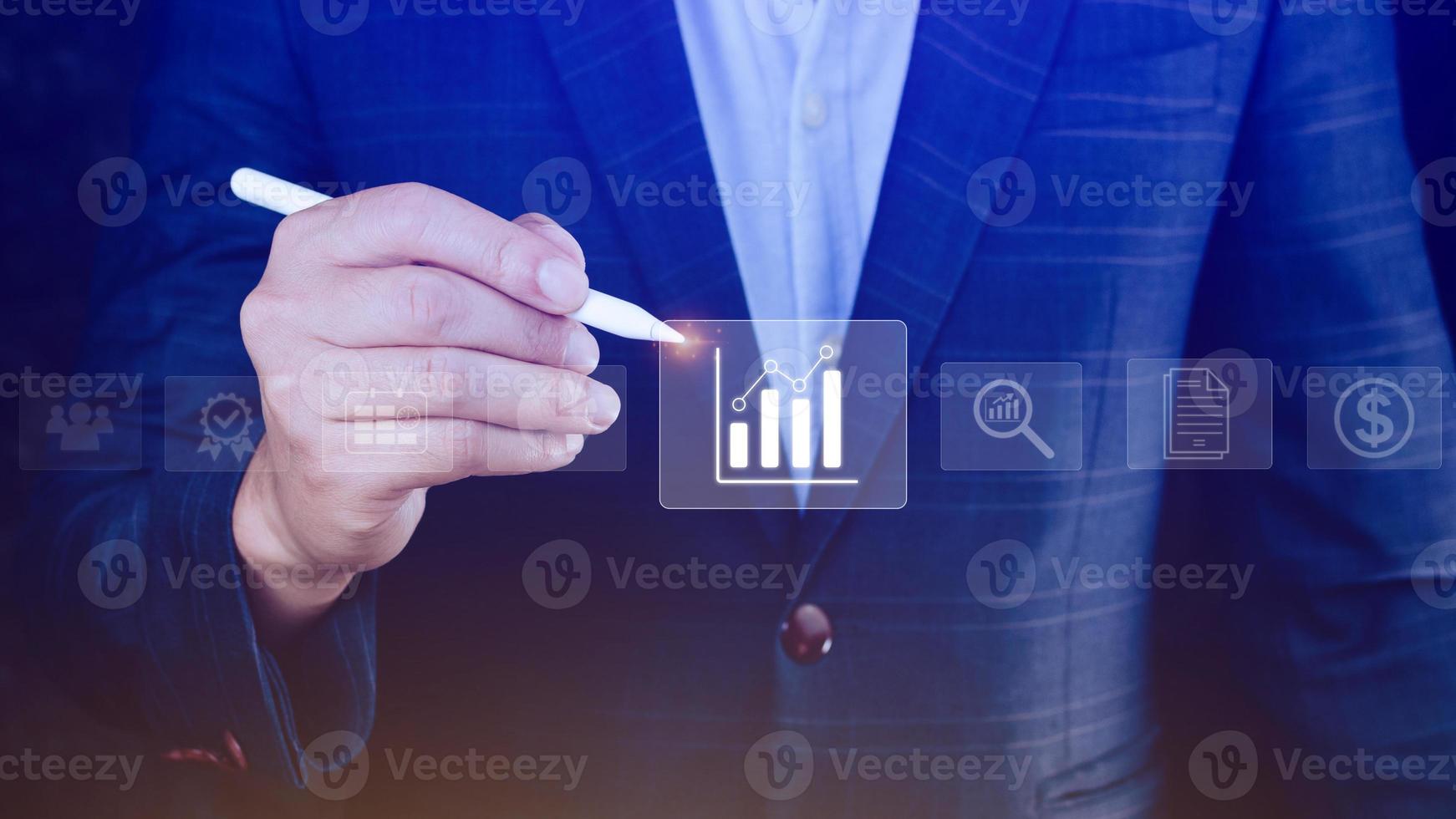 Big data analytics and business intelligence BI concept with chart and graph icons on digital screen interface and business people in the background. photo