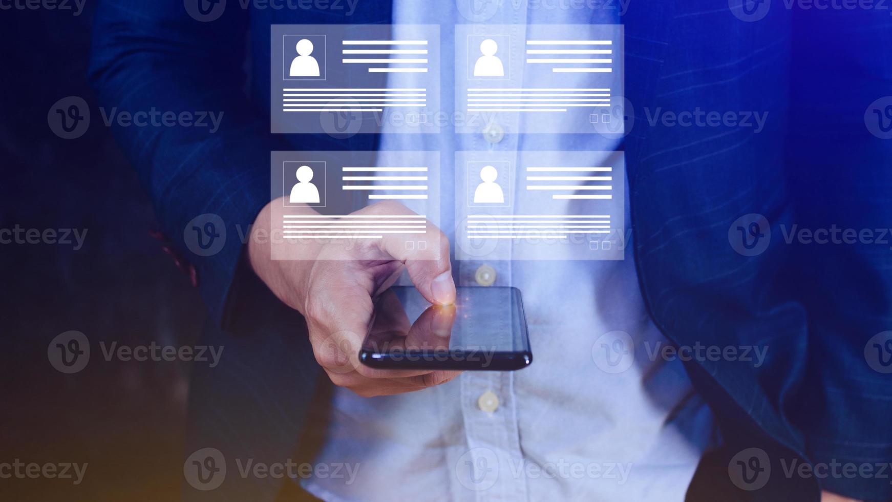 Human resources manager choosing professional profile to hire on virtual screen interface, recruitment concept. Businessman hand pointing icon resource HR management concept photo