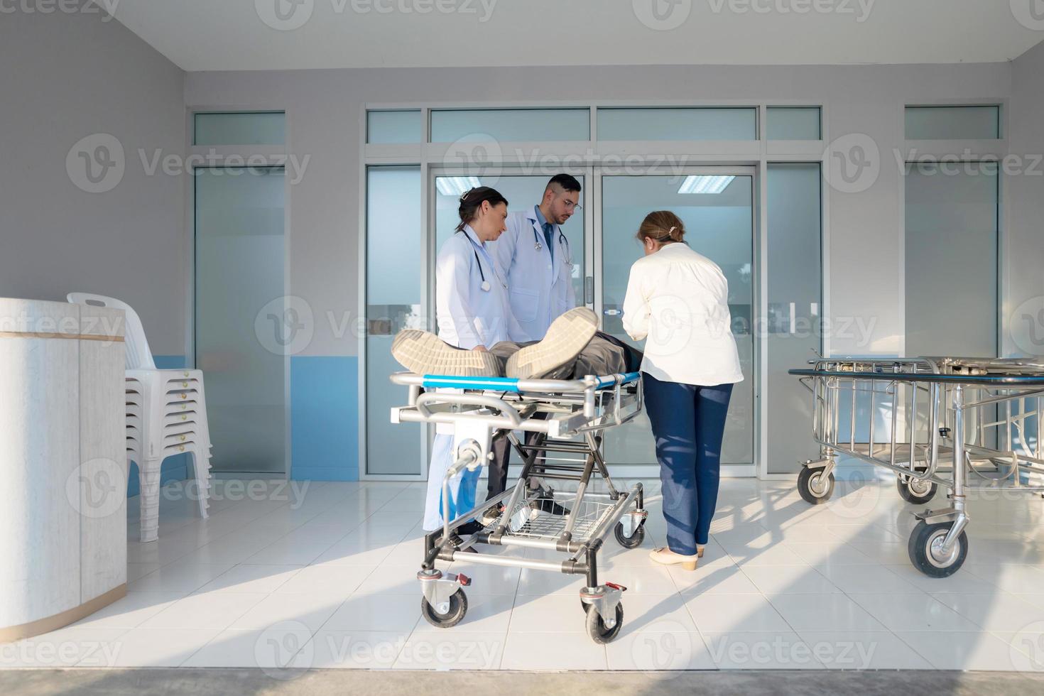 The emergency patient lies in a hospital bed. photo