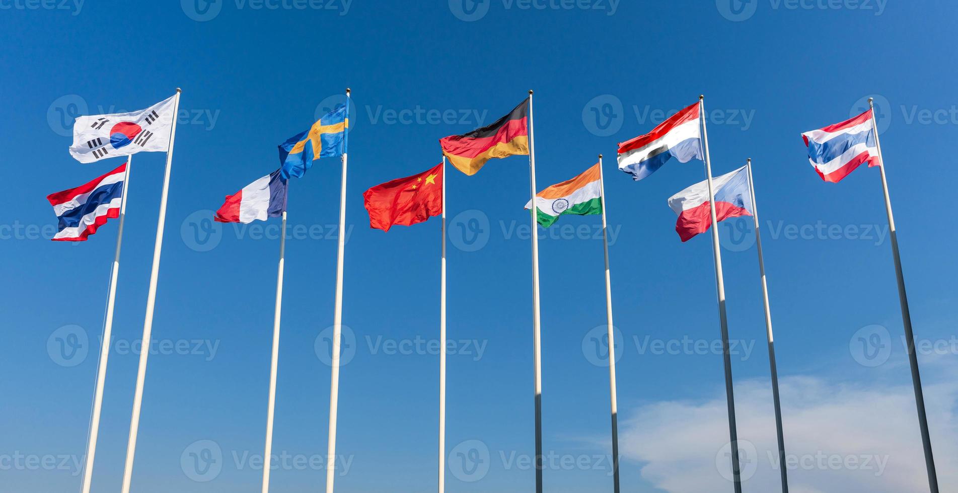 The national flags of nine nations, Thailand, South Korea, France, Sweden, China, Germany, Czech Republic, Netherlands, India photo