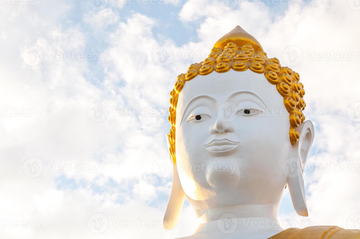 Big Buddha statue Wat Phra That Doi Kham at Chiang Mai,Thai temple Northern  Thailand photo