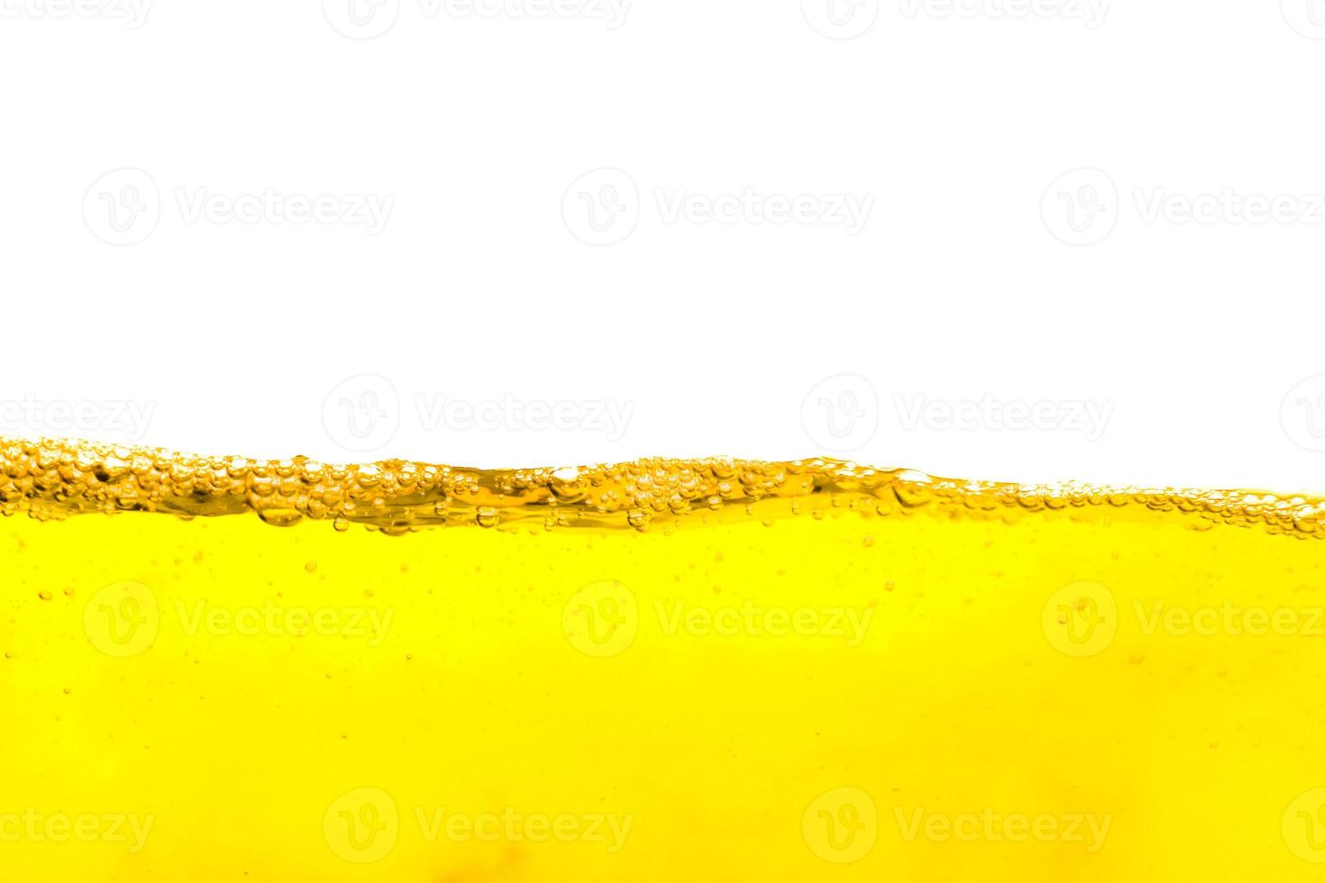 Beautiful wave of air bubble inside isolated on white background,yellow summer drink with bubbles,Beer bubbles photo