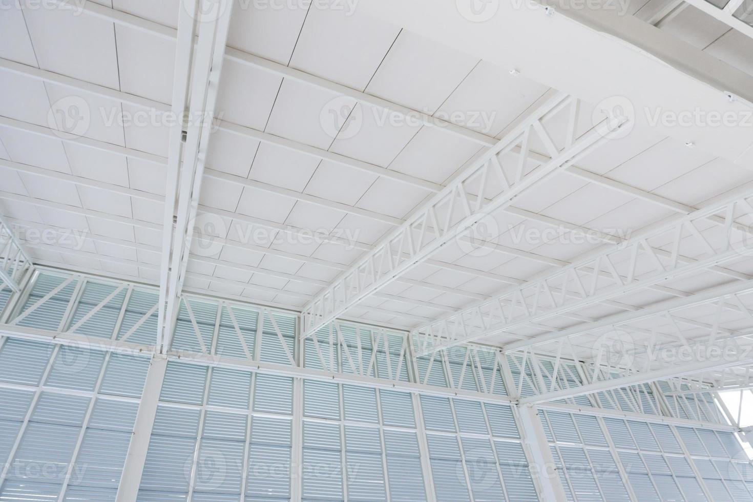 Large steel structure truss, roof frame and metal sheet in building construction site photo