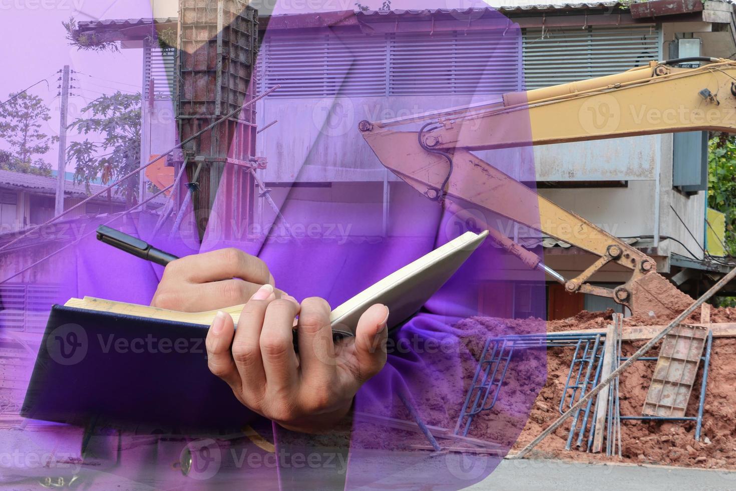 Double exposure of businessman  with notepad in hand signing documents in construction  site workplace concept. photo