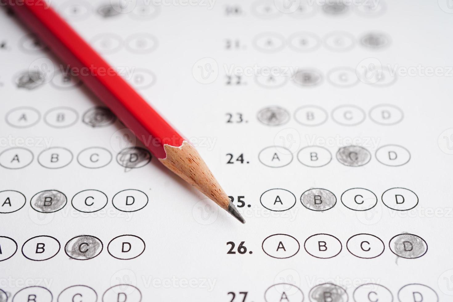 Answer sheets with pencil drawing fill to select choice, education concept. photo