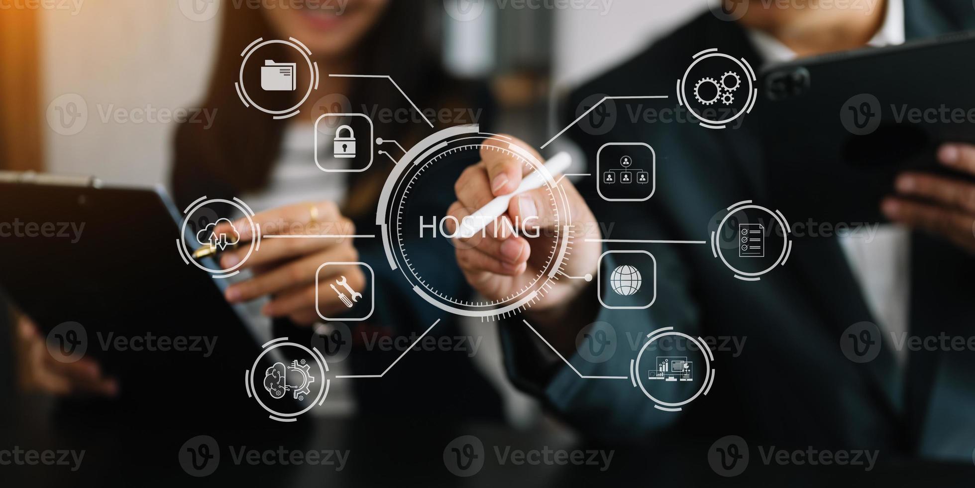 Web hosting concept, woman using computer, tablet and presses his finger on the virtual screen inscription Hosting on desk, Internet, business, digital technology concept. photo