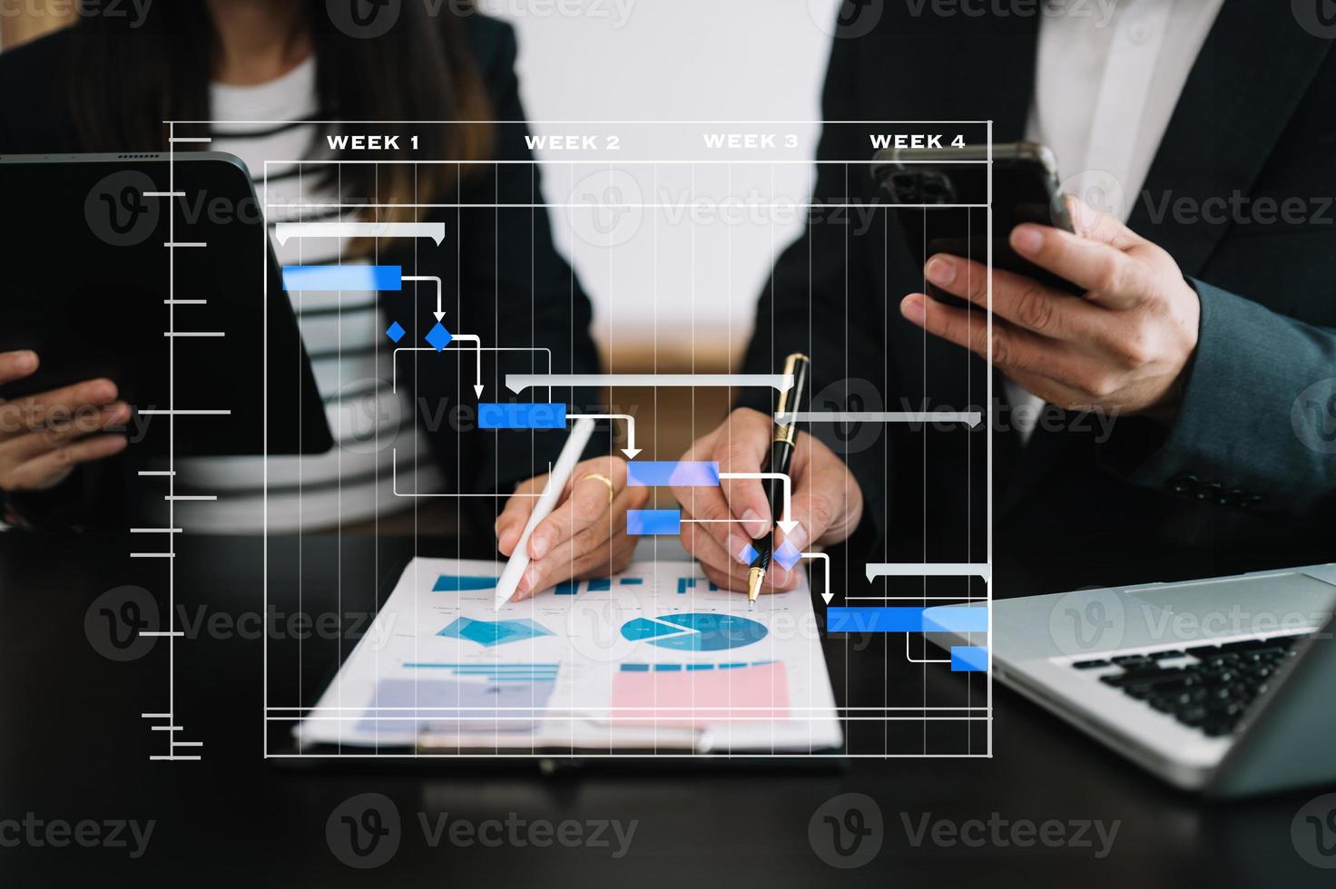 Project manager working and update tasks with milestones progress planning and Gantt chart scheduling diagram.business tram working at office photo