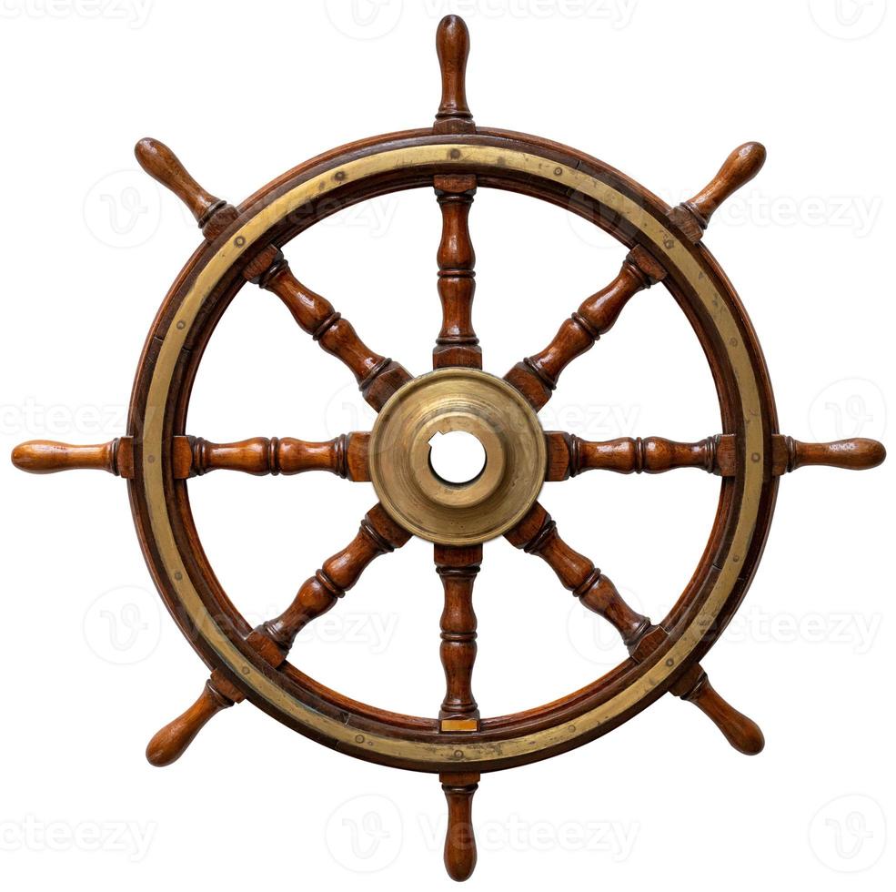 Old ship wooden steering wheel rudder isolated on white background photo