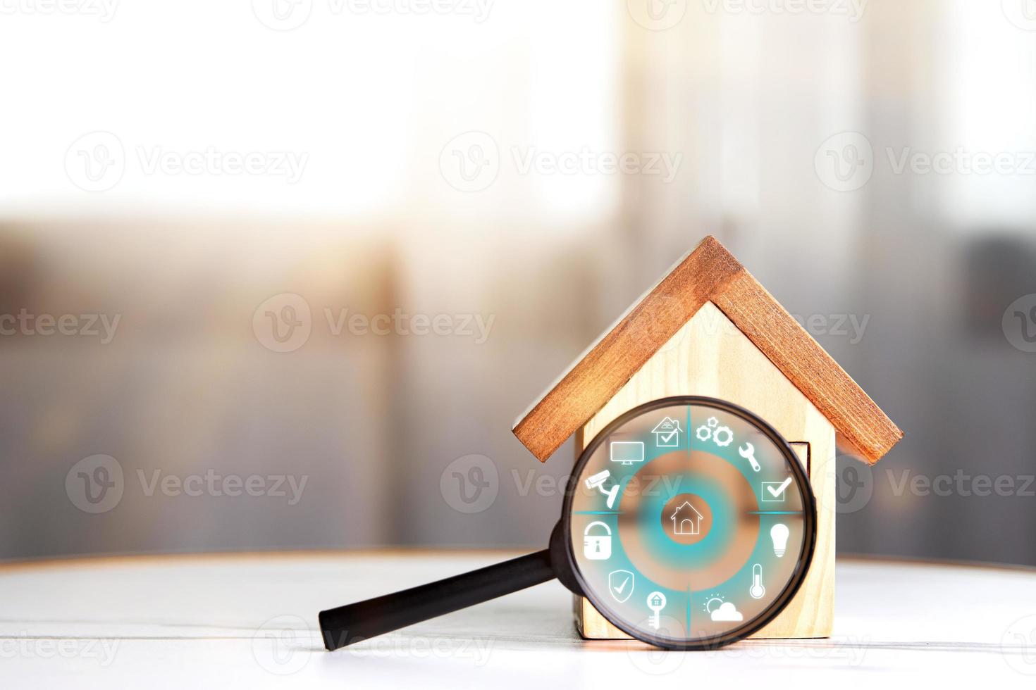 Smart home concept with automation control. Network technology innovation of home security systems, cybersecurity of home devices. Wooden house and magnifying glass with smart home icon photo