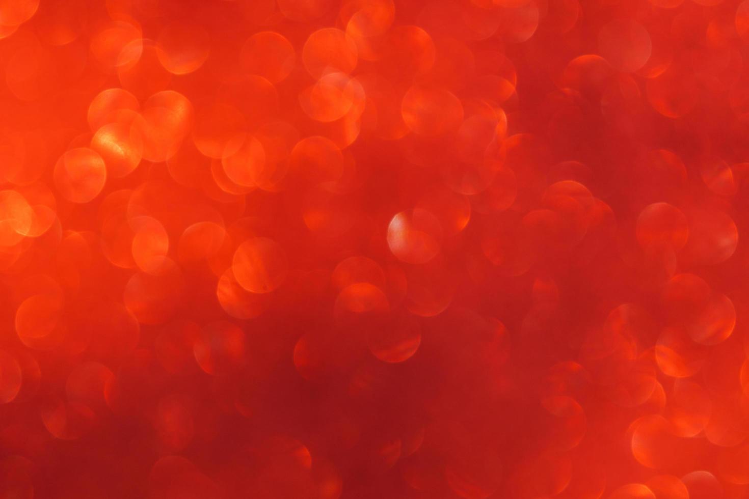 Red bokeh and defocused background with copy space photo