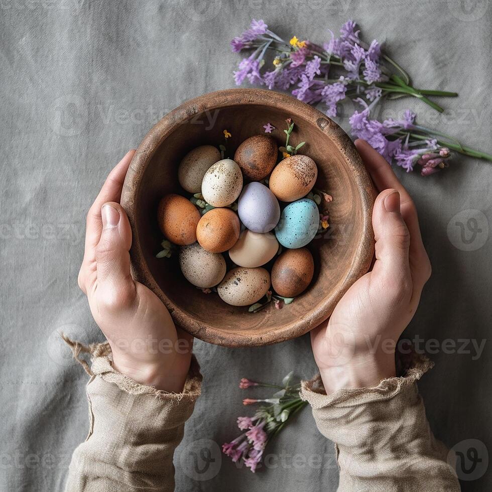 A beautiful Easter background with colorful eggs ready to be served at the festive table. photo