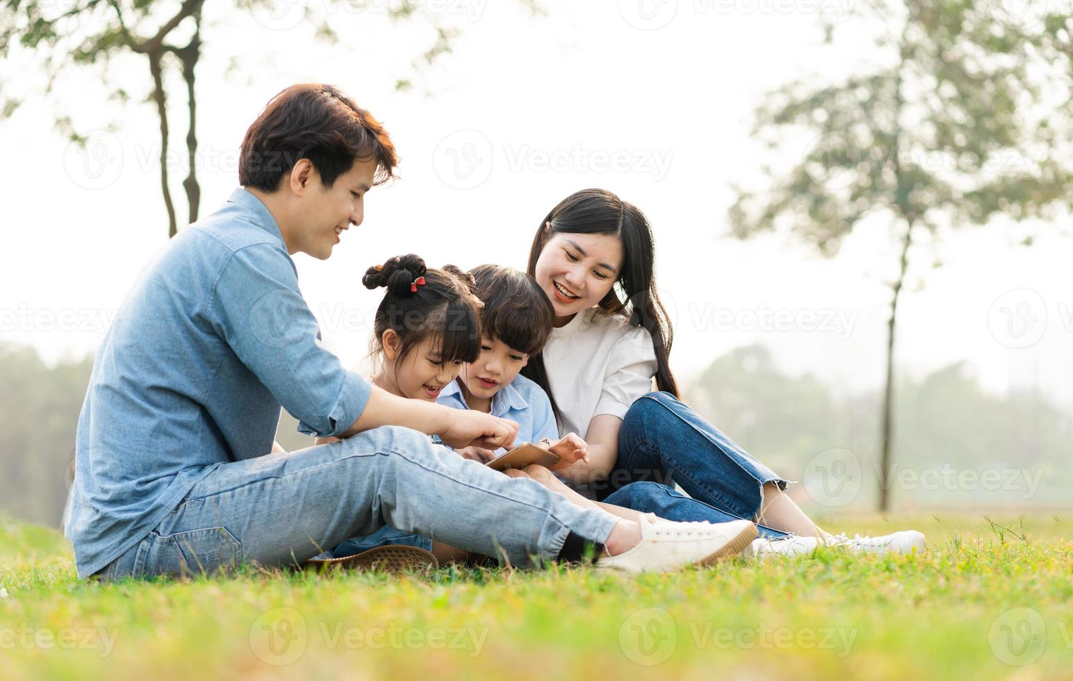 Image of an Asian family in the park photo