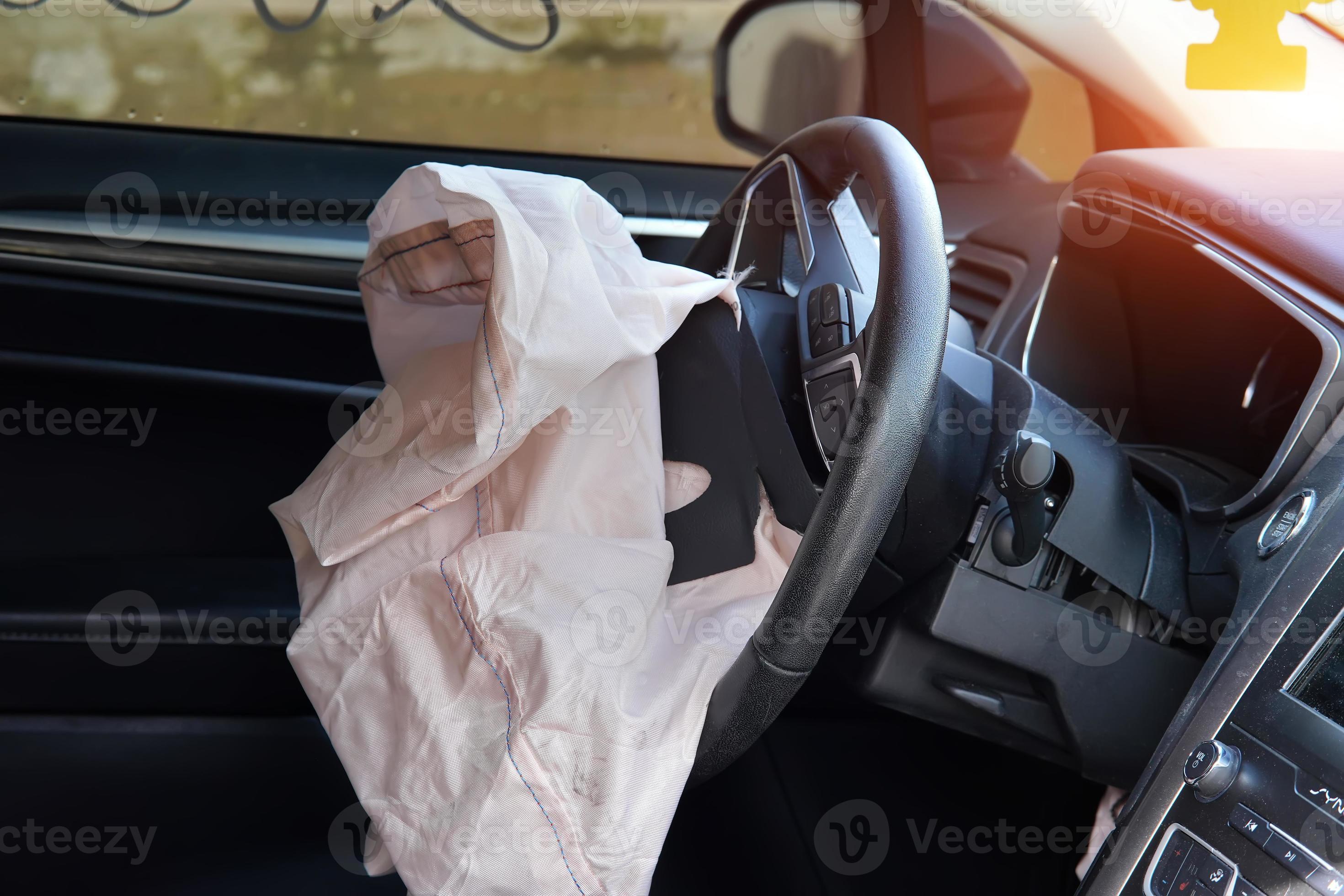 triggered airbag on the steering wheel of the car 21832341 Stock Photo