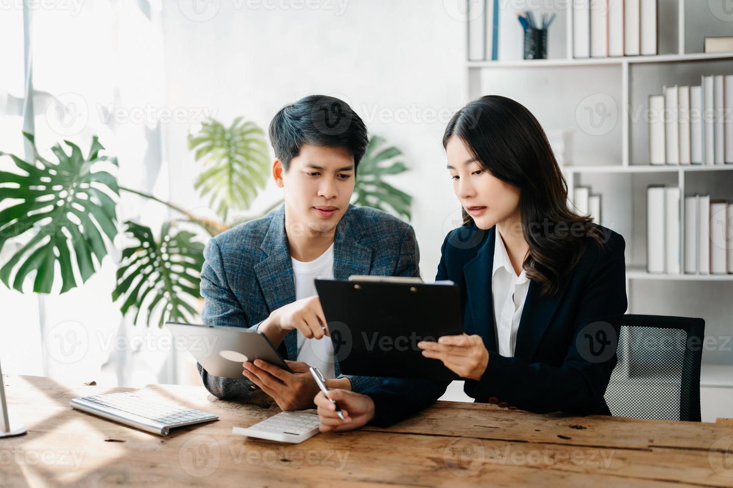 Portrait of success business people working together in home office. Couple teamwork startup concept photo