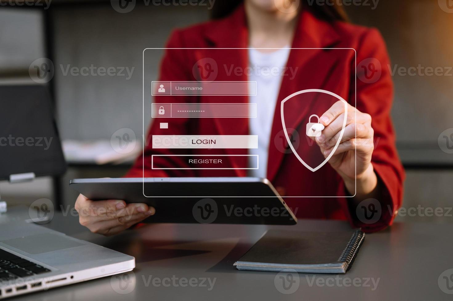 Cyber security concept, Login, User, identification information security and encryption, secure access to user's personal information woman using smart phone and tablet in office photo
